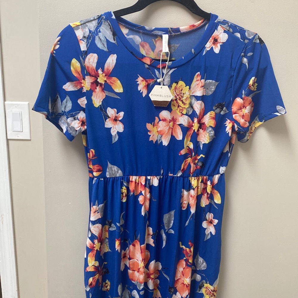 New with tags. Never been worn maternity maxi dress